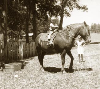 Ranger and little brother Lon with Julie directing  -  August 1959 photo